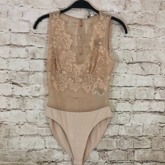 Forever 21 Other - NWT nude lace body suit size small